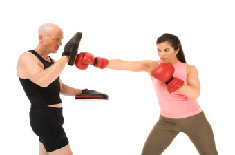 Photo of boxercise/kickboxing session in progress.