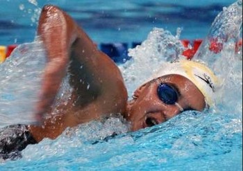 Photo of a swimmer who is swimming for fitness.